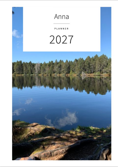 Cover: Anna, Planner, 2027, with a forest lake